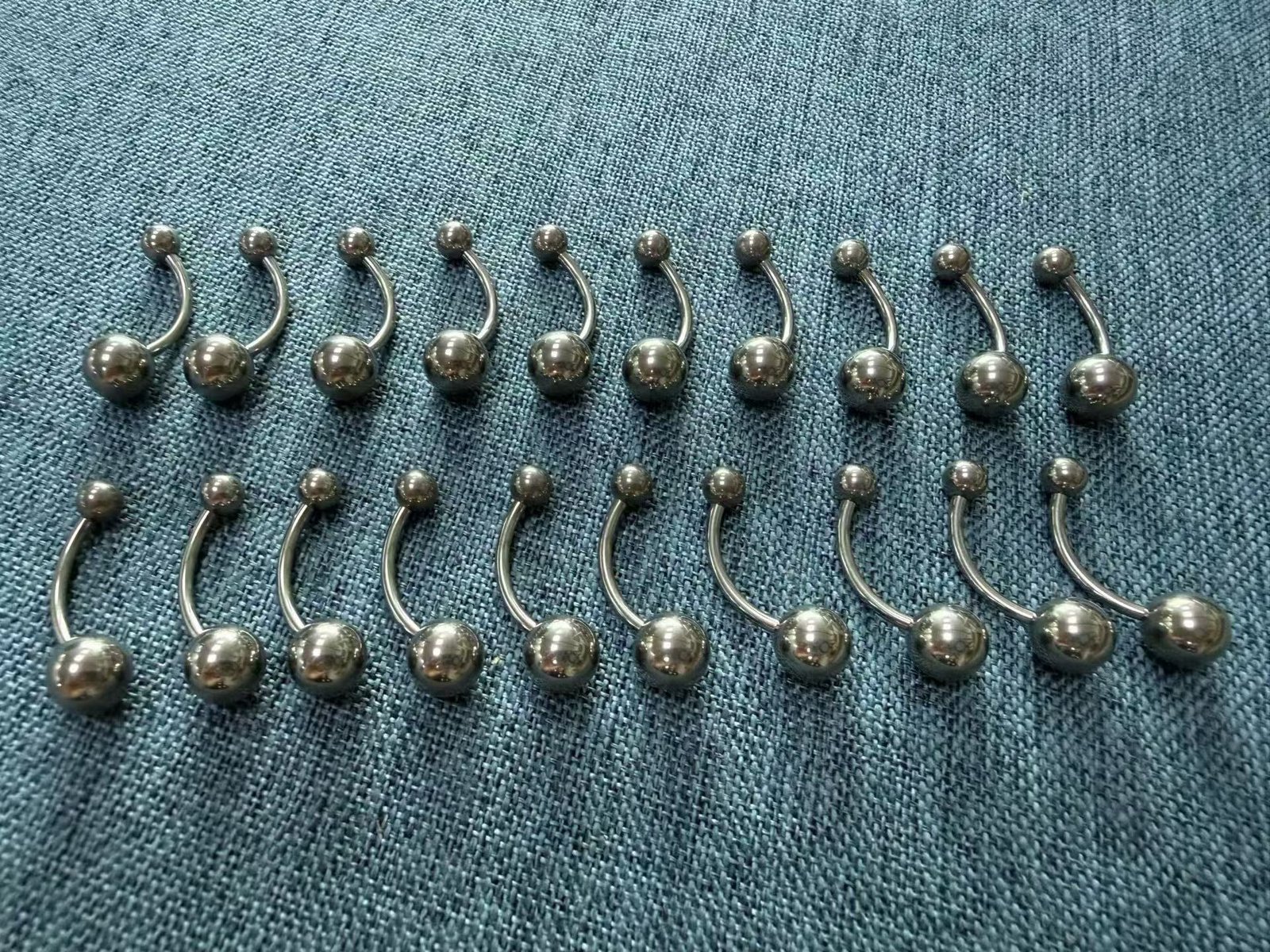 Finished belly jewelry pieces arranged for checking